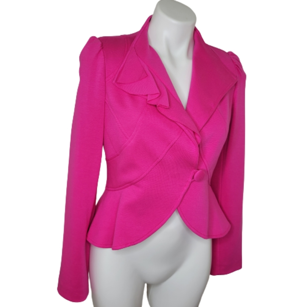 Inc. pink small jacket with ruffle at bottom of back.